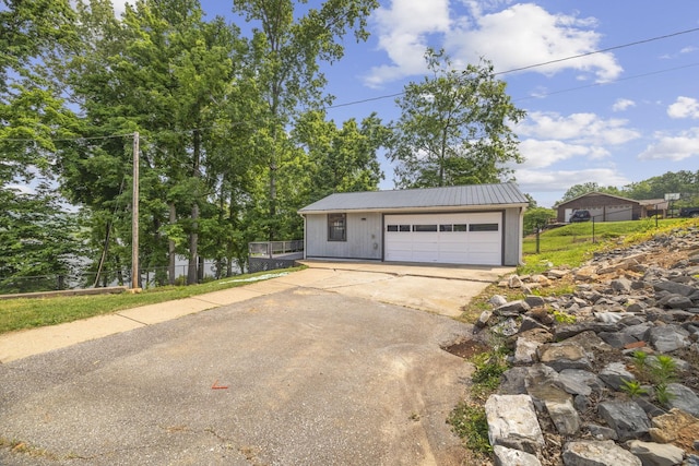 255 Whispering Hills Dr, Dover, TN 37058 - detached garage featuring driveway