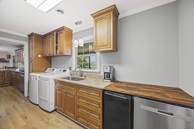 255 Whispering Hills Dr, Dover, TN 37058 - kitchen featuring a sink, separate washer and dryer, light wood-type flooring, stainless steel dishwasher, and ornamental molding