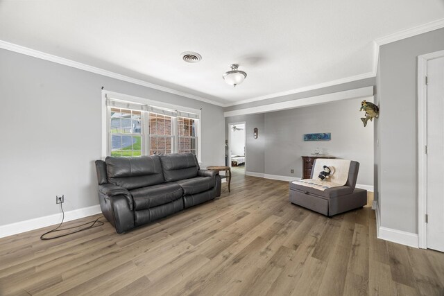255 Whispering Hills Dr, Dover, TN 37058 - living room featuring ornamental molding, wood finished floors, and baseboards