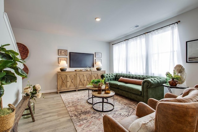 1752 Wren Way, Lebanon, TN 37087 - living area featuring light wood-type flooring, baseboards, and recessed lighting