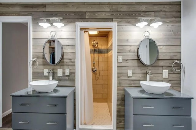 13276 Old Baxter Rd, Silver Point, TN 38582 - full bathroom with a shower stall, vanity, and wooden walls