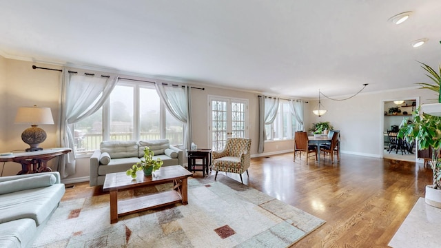 305 Rolling Mill Rd, Old Hickory, TN 37138 - living area with crown molding, wood finished floors, and baseboards