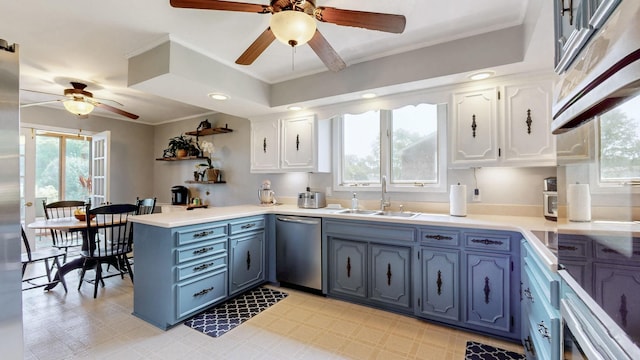 305 Rolling Mill Rd, Old Hickory, TN 37138 - kitchen featuring dishwasher, a sink, a ceiling fan, a peninsula, and white cabinetry