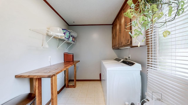 305 Rolling Mill Rd, Old Hickory, TN 37138 - laundry room featuring washer and clothes dryer, crown molding, light flooring, cabinet space, and a textured ceiling