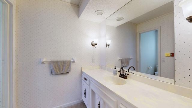 305 Rolling Mill Rd, Old Hickory, TN 37138 - bathroom with toilet, vanity, and wallpapered walls