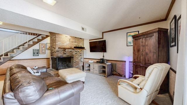 305 Rolling Mill Rd, Old Hickory, TN 37138 - living room with wainscoting, carpet floors, stairway, a fireplace, and a textured ceiling