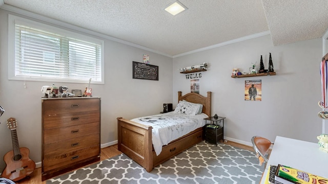305 Rolling Mill Rd, Old Hickory, TN 37138 - bedroom featuring a textured ceiling, wood finished floors, baseboards, and crown molding