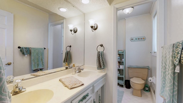 305 Rolling Mill Rd, Old Hickory, TN 37138 - bathroom with double vanity, toilet, tile patterned floors, and crown molding