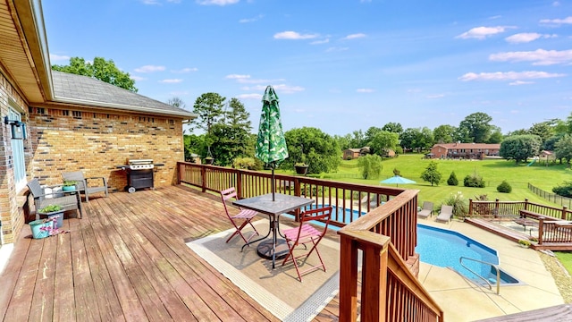 305 Rolling Mill Rd, Old Hickory, TN 37138 - wooden deck featuring outdoor dining area, area for grilling, and a lawn