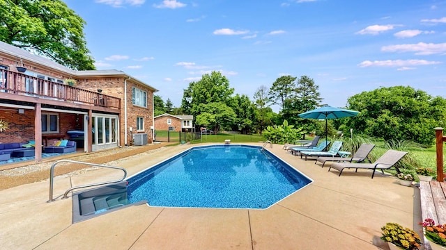 305 Rolling Mill Rd, Old Hickory, TN 37138 - swimming pool featuring a patio, central AC, and an outdoor living space