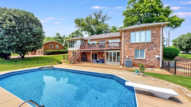 305 Rolling Mill Rd, Old Hickory, TN 37138 - view of swimming pool featuring stairway, a deck, a diving board, a fenced backyard, and central AC