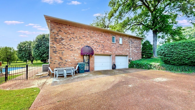 305 Rolling Mill Rd, Old Hickory, TN 37138 - view of home's exterior with brick siding, concrete driveway, and an attached garage