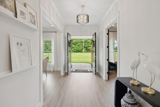 2648 Wilson Overall Rd, Murfreesboro, TN 37127 - foyer featuring a chandelier, light wood finished floors, baseboards, and ornamental molding