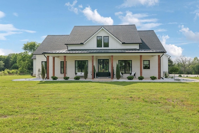2648 Wilson Overall Rd, Murfreesboro, TN 37127 - back of house featuring a standing seam roof, covered porch, and a shingled roof