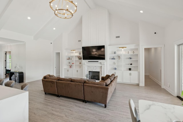 2648 Wilson Overall Rd, Murfreesboro, TN 37127 - living area with high vaulted ceiling, baseboards, a chandelier, light wood-type flooring, and a fireplace