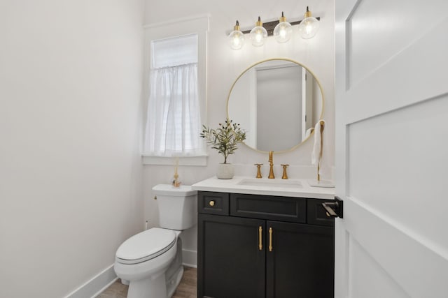 2648 Wilson Overall Rd, Murfreesboro, TN 37127 - bathroom featuring toilet, vanity, baseboards, and wood finished floors