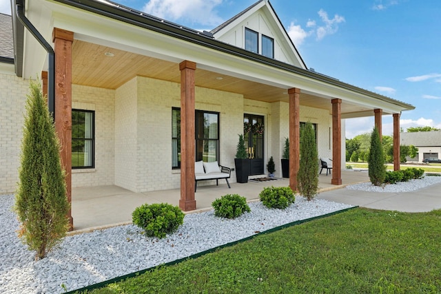 2648 Wilson Overall Rd, Murfreesboro, TN 37127 - rear view of house with a porch and brick siding