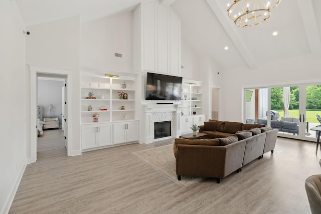 2648 Wilson Overall Rd, Murfreesboro, TN 37127 - living room with high vaulted ceiling, a fireplace, a chandelier, beam ceiling, and light wood-style floors