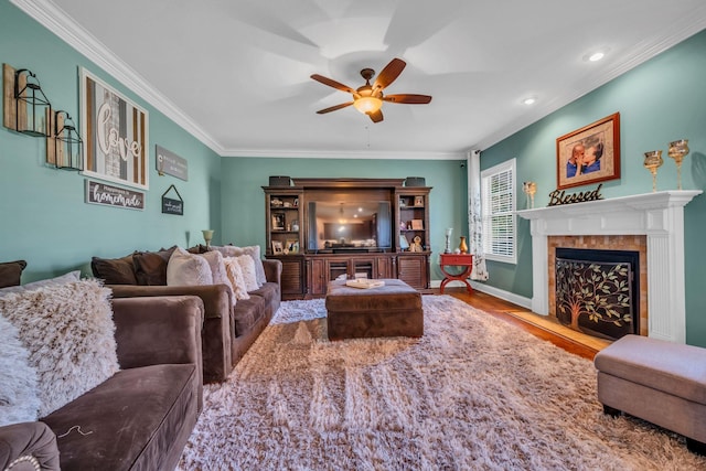 3112 Timberdale Dr, Clarksville, TN 37042 - living room with ceiling fan, wood finished floors, ornamental molding, a fireplace with flush hearth, and baseboards