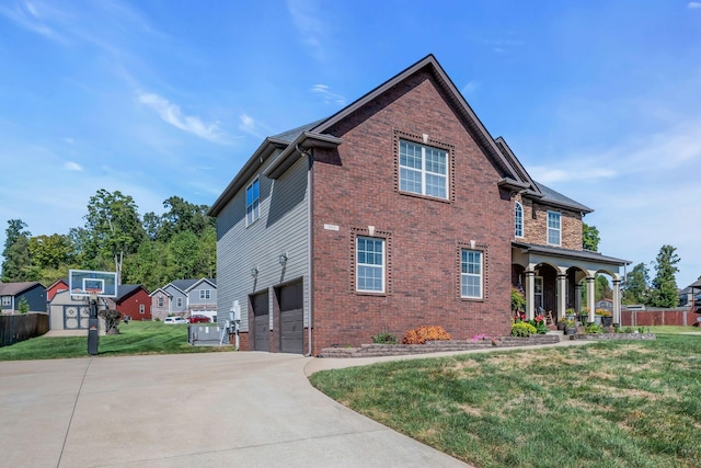 3112 Timberdale Dr, Clarksville, TN 37042 - view of side of property featuring a garage, brick siding, and concrete driveway