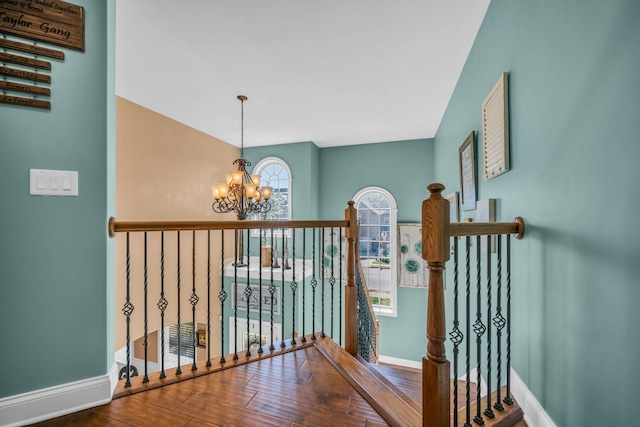 3112 Timberdale Dr, Clarksville, TN 37042 - hall featuring an upstairs landing, a chandelier, baseboards, and wood finished floors