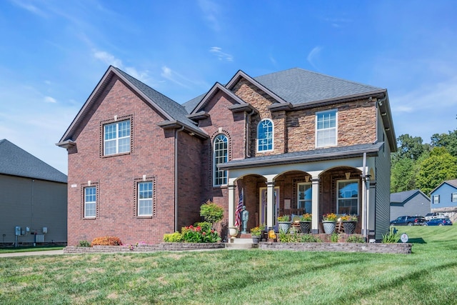 3112 Timberdale Dr, Clarksville, TN 37042 - traditional-style home featuring a porch, a front yard, and brick siding