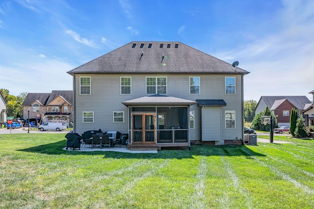 3112 Timberdale Dr, Clarksville, TN 37042 - rear view of property featuring a sunroom, a yard, central air condition unit, and a patio area