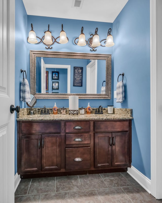 3112 Timberdale Dr, Clarksville, TN 37042 - bathroom featuring double vanity and baseboards