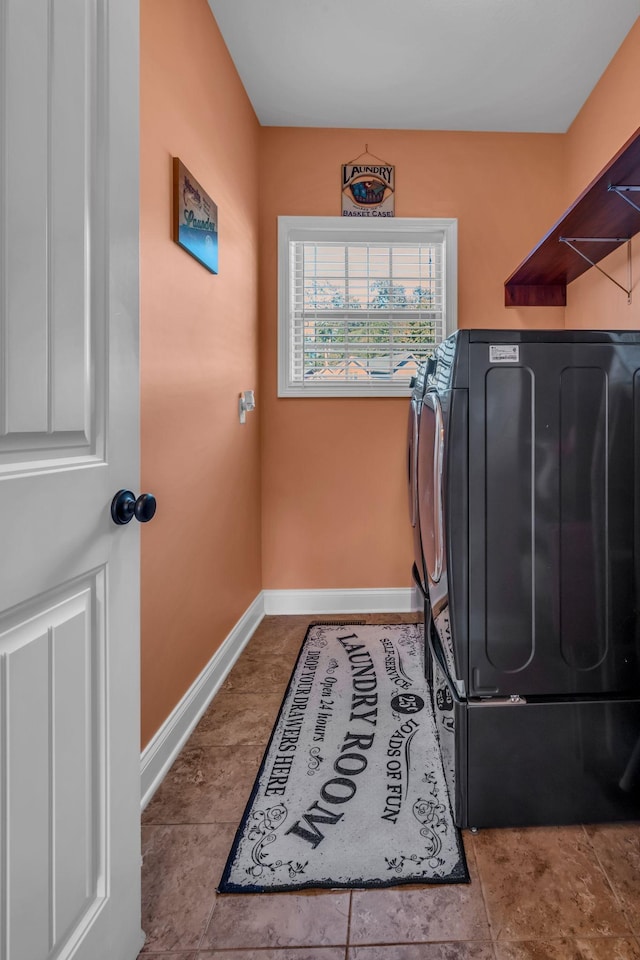 3112 Timberdale Dr, Clarksville, TN 37042 - washroom featuring separate washer and dryer and baseboards