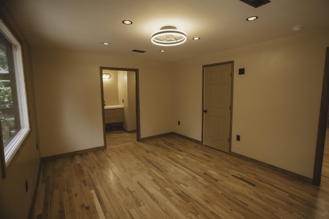 310 E 15th St, Columbia, TN 38401 - unfurnished room with wood finished floors, recessed lighting, baseboards, and a smoke detector
