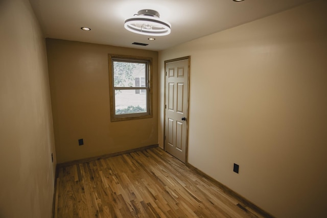 310 E 15th St, Columbia, TN 38401 - spare room featuring wood finished floors, baseboards, and recessed lighting
