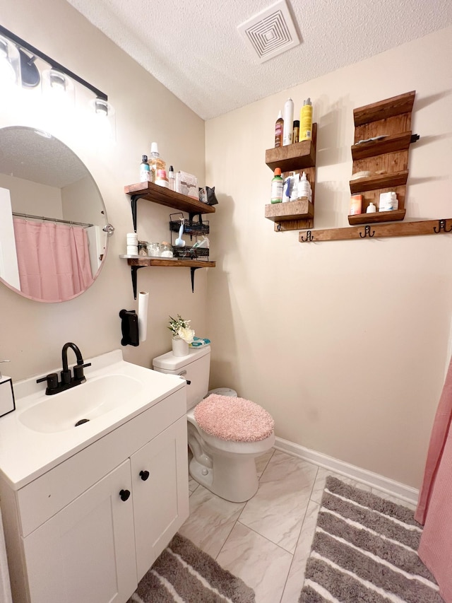 108 Josephines Ct, Oak Grove, KY 42262 - bathroom with marble finish floors, toilet, vanity, and a textured ceiling