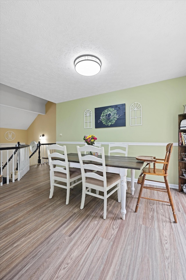 152 Scenic Cir, Ringgold, GA 30736 - dining area with wood finished floors and a textured ceiling