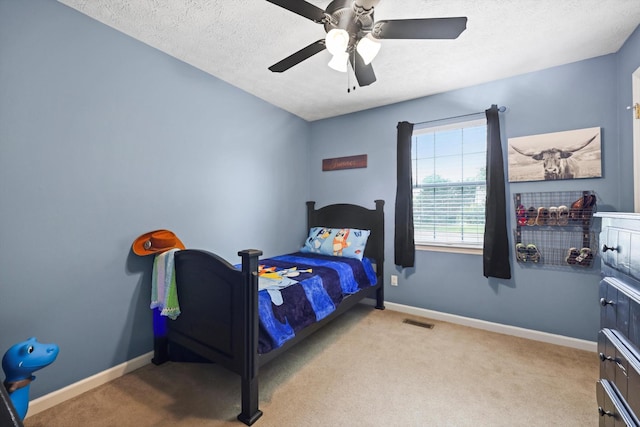 152 Scenic Cir, Ringgold, GA 30736 - bedroom featuring carpet floors, a textured ceiling, baseboards, and ceiling fan