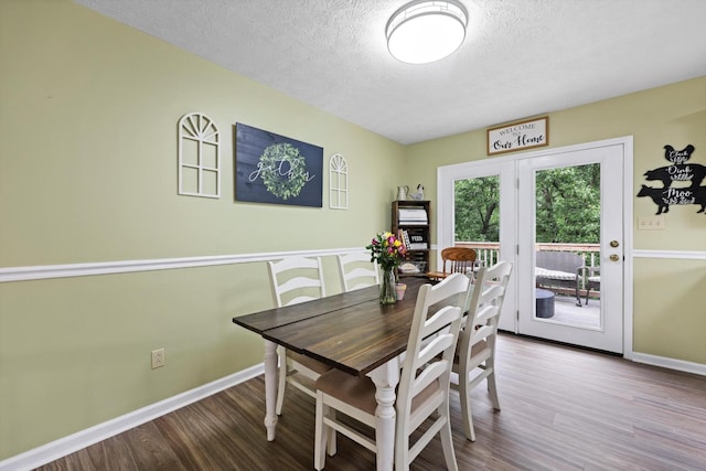 152 Scenic Cir, Ringgold, GA 30736 - dining area with wood finished floors, a textured ceiling, and baseboards