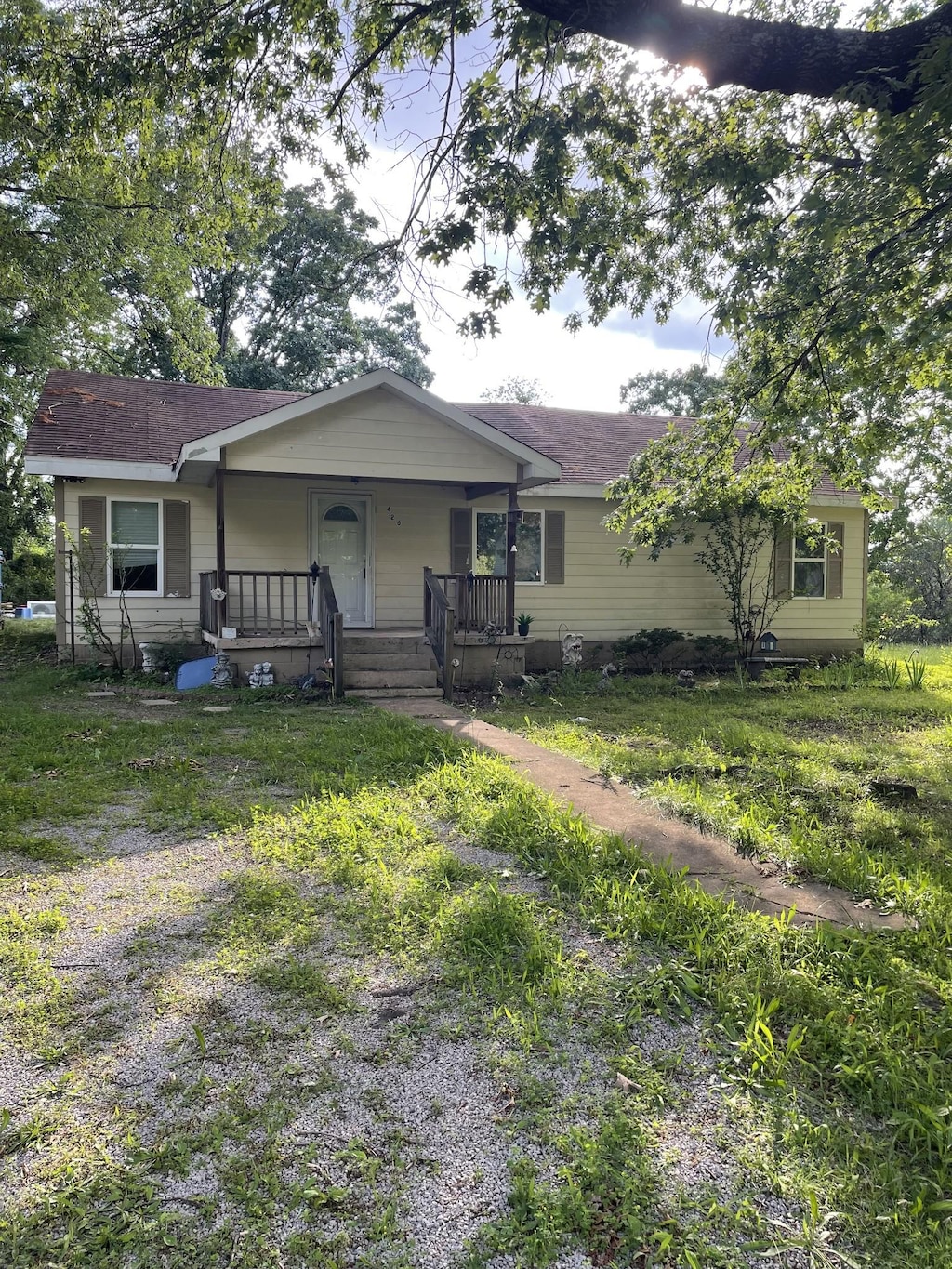 426 Eastside Dr, White Bluff, TN 37187 - view of front of home with covered porch and roof with shingles