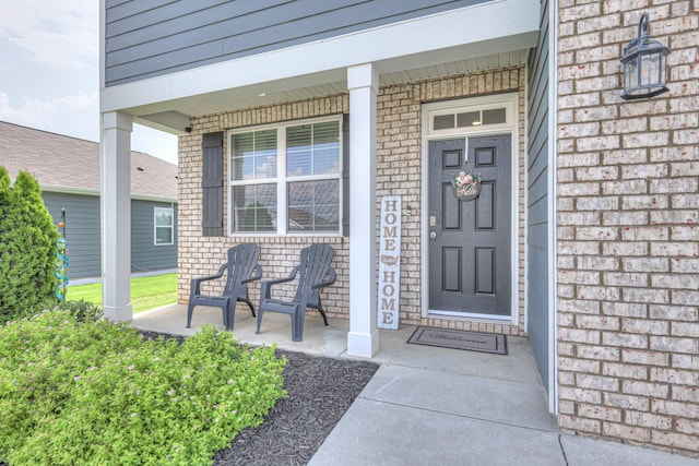 336 Ryan Rd, Chapel Hill, TN 37034 - doorway to property featuring covered porch and brick siding