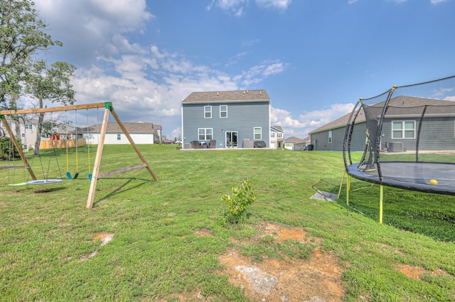 336 Ryan Rd, Chapel Hill, TN 37034 - view of grassy yard featuring a trampoline, a playground, and a patio