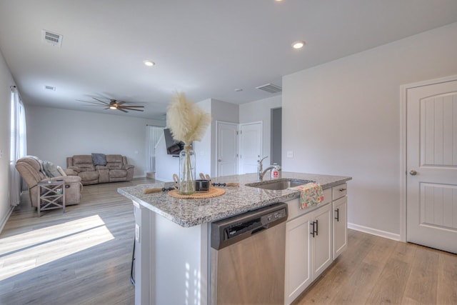 336 Ryan Rd, Chapel Hill, TN 37034 - kitchen with stainless steel dishwasher, a ceiling fan, white cabinetry, a kitchen island with sink, and light wood-type flooring