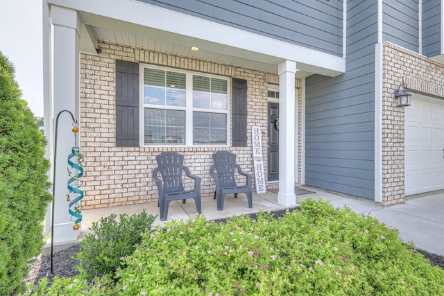 336 Ryan Rd, Chapel Hill, TN 37034 - entrance to property featuring covered porch, brick siding, and a garage
