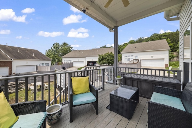 1305 Decatur Cir, Franklin, TN 37067 - deck featuring a ceiling fan, a garage, a residential view, and an outbuilding