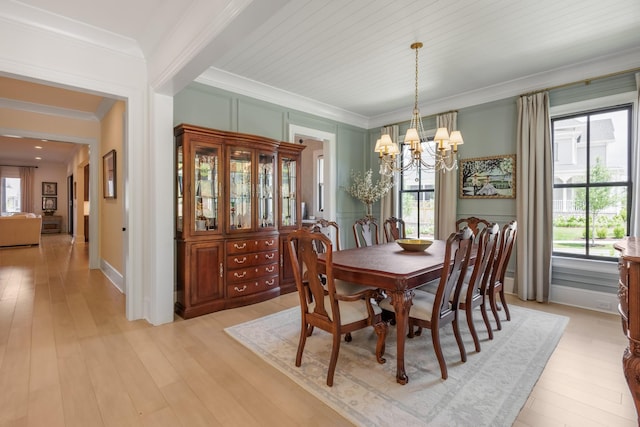 2026 Eliot Rd, Franklin, TN 37064 - dining space featuring a chandelier, crown molding, and light wood-style floors