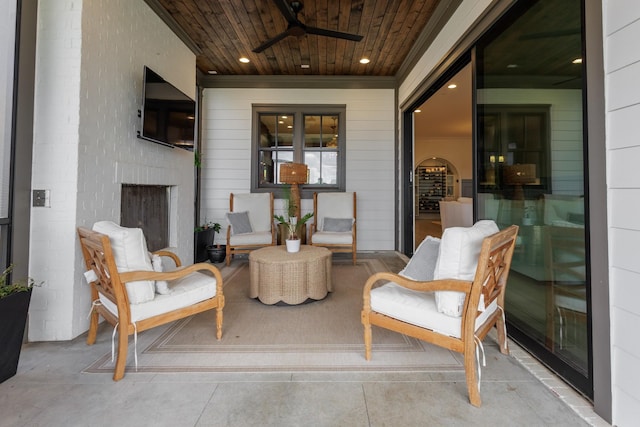 2026 Eliot Rd, Franklin, TN 37064 - view of patio with ceiling fan and a fireplace