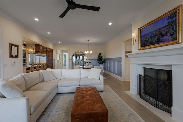 2026 Eliot Rd, Franklin, TN 37064 - living area featuring a chandelier, recessed lighting, light wood finished floors, ceiling fan, and a fireplace with flush hearth