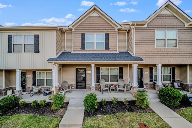 4113 Saddlecreek Way, Antioch, TN 37013 - view of front of property featuring covered porch, stone siding, and roof with shingles