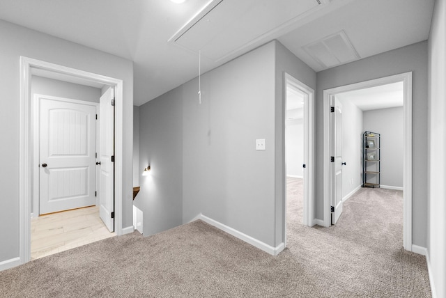 324 Kildeer Dr, Clarksville, TN 37040 - hallway with attic access, carpet flooring, and baseboards