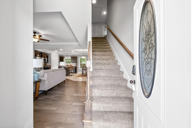 324 Kildeer Dr, Clarksville, TN 37040 - entrance foyer featuring wood finished floors, stairs, a ceiling fan, and ornamental molding