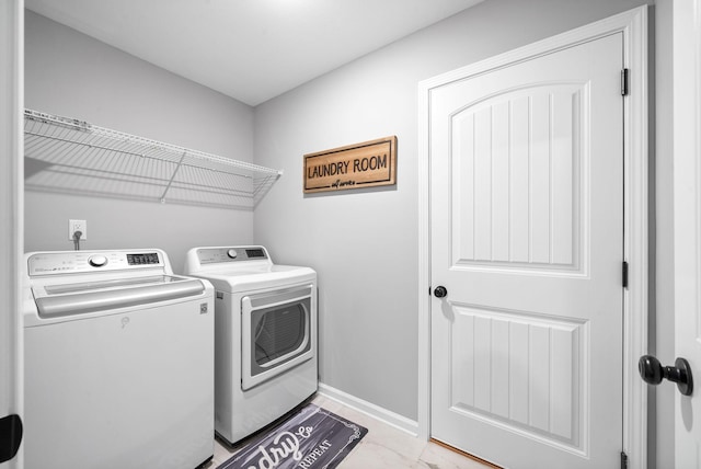 324 Kildeer Dr, Clarksville, TN 37040 - laundry room with independent washer and dryer and baseboards