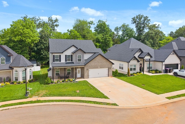 324 Kildeer Dr, Clarksville, TN 37040 - view of front of home featuring a front yard, driveway, brick siding, and an attached garage