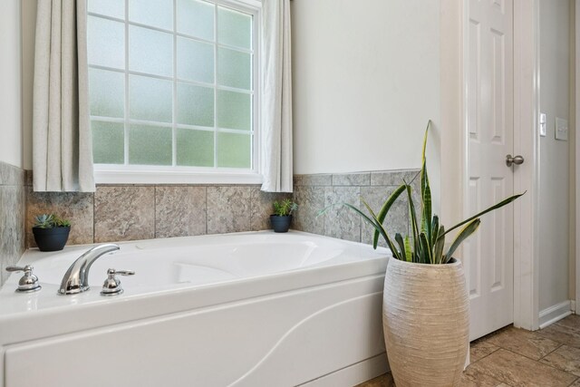 1809 Mosley Ferry Rd, Chapmansboro, TN 37035 - bathroom with a bath